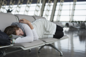 woman sleeping in airport